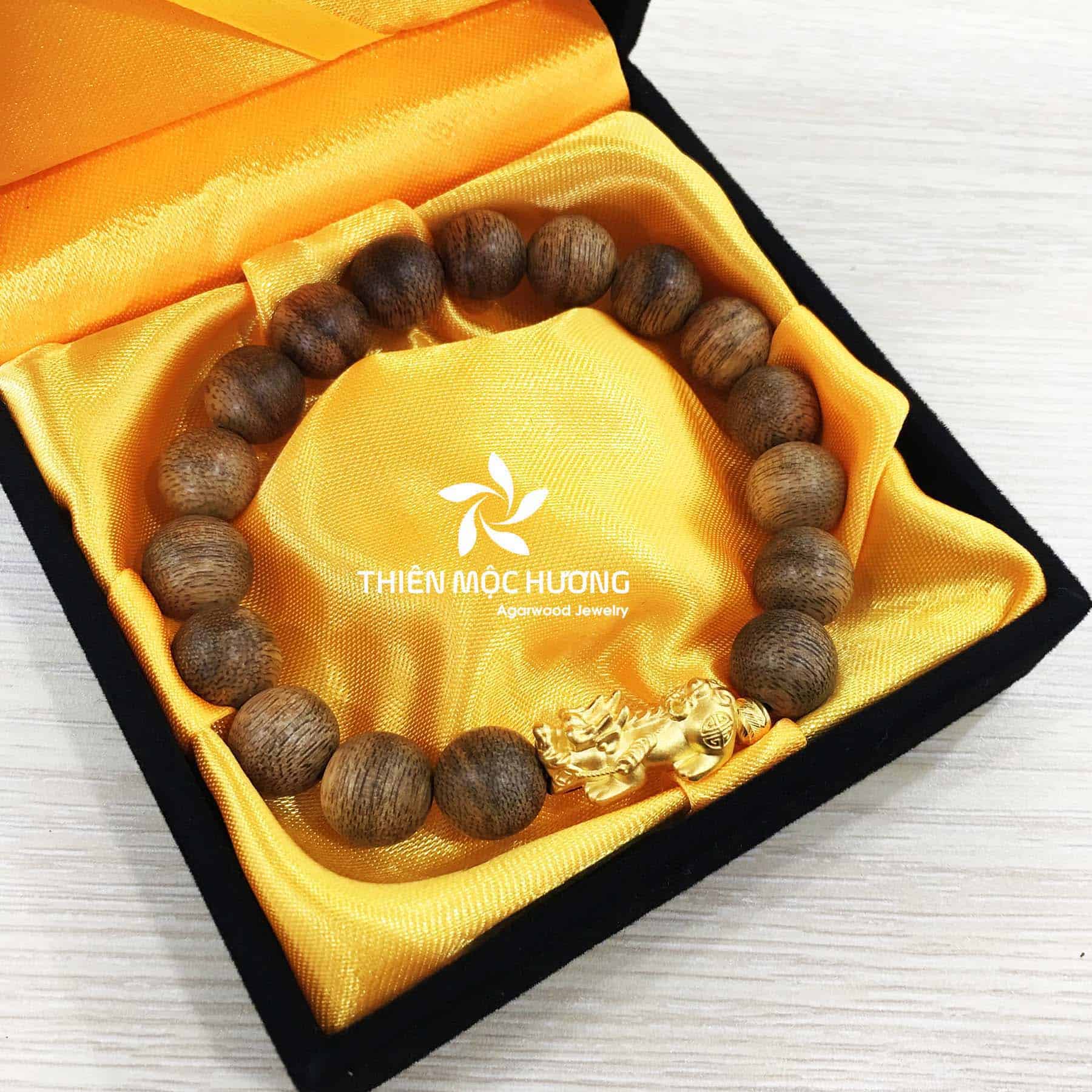 Vòng tay Trầm Hương Tỳ Hưu vàng