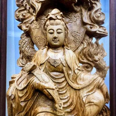 Ý nghĩa của Tượng trầm hương Thiên Long che Đức Phật